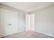 Cozy bedroom with plush carpet and double door closet at 7217 Rena Mae Ln, Charlotte, NC 28227