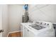 This laundry room features modern appliances and wire shelving at 7217 Rena Mae Ln, Charlotte, NC 28227