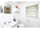 Full bathroom featuring a vanity with sink, toilet, and window at 801 Fugate Ave, Charlotte, NC 28205