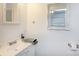 Bathroom featuring a mirror with a decorative frame and single sink at 801 Fugate Ave, Charlotte, NC 28205