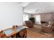 Living room with hardwood floors, flat screen TV, and lots of seating at 801 Fugate Ave, Charlotte, NC 28205