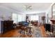 Inviting living room features hardwood floors, neutral paint, and a large window at 801 Fugate Ave, Charlotte, NC 28205