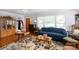 Bright living room with hardwood floors and a large window at 801 Fugate Ave, Charlotte, NC 28205