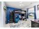 Bedroom featuring a loft bed, desk, blue walls, and a ceiling fan at 920 Manor Dr, Kings Mountain, NC 28086