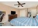 Spacious bedroom with a TV, dresser, and access to a bathroom, providing a private and comfortable retreat at 920 Manor Dr, Kings Mountain, NC 28086