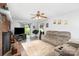 Welcoming living room with fireplace, comfortable seating, and view to the backyard perfect for entertaining at 920 Manor Dr, Kings Mountain, NC 28086