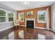 Bright living room with fireplace, hardwood floors, neutral colors and lots of natural light at 9450 Surface Hill Rd, Mint Hill, NC 28227