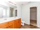 Bathroom featuring double sinks and a large mirror with natural light at 1007 Green Terra Rd, Indian Trail, NC 28079