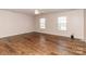 Bedroom featuring ceiling fan and natural light from two windows at 1007 Green Terra Rd, Indian Trail, NC 28079