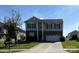 Charming two-story home with well-maintained landscaping and a welcoming front porch and two-car garage at 1007 Green Terra Rd, Indian Trail, NC 28079