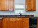 Well-appointed kitchen with a stainless steel dishwasher, and granite countertops at 1007 Green Terra Rd, Indian Trail, NC 28079