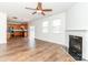 Open-concept living room flows to the kitchen and has a fireplace at 1007 Green Terra Rd, Indian Trail, NC 28079