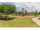Community playground with multiple slides, climbing structures, and ample space for children to play at 1007 Green Terra Rd, Indian Trail, NC 28079