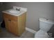 Bathroom features a standard vanity, and toilet at 1038 Holmes Ave, Salisbury, NC 28144
