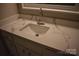 Bathroom vanity featuring a stylish marble countertop at 1038 Holmes Ave, Salisbury, NC 28144