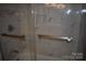 Modern tiled shower with glass door and built-in niche at 1038 Holmes Ave, Salisbury, NC 28144