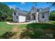 Beautiful white brick home featuring an elegant entrance and landscaped front yard at 1062 Sage Pine Cir, Clover, SC 29710