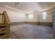 Large garage with access stairs and a window at 1062 Sage Pine Cir, Clover, SC 29710