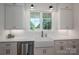Farmhouse-style kitchen with a large sink, white cabinets, subway tile, and stainless steel dishwasher at 1062 Sage Pine Cir, Clover, SC 29710