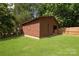 A charming outbuilding with plenty of storage sits in the expansive yard of this home at 111 Berry St, Chester, SC 29706