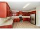 Spacious kitchen with stainless steel appliances, granite countertops, and ample cabinet space at 11305 Erwin Ridge Ave, Charlotte, NC 28213