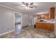 Spacious kitchen features wood cabinets, linoleum flooring, and an open layout, ideal for Gathering meals at 1132 Arbor Dr, Salisbury, NC 28144