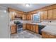 Well-equipped kitchen with stainless steel appliances and wood cabinets, providing a functional and stylish cooking space at 1132 Arbor Dr, Salisbury, NC 28144