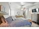 Cozy bedroom featuring neutral colors, and large dresser and ample natural light at 11359 Deer Ridge Ln, Charlotte, NC 28277