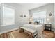 Cozy bedroom with neutral tones, a comfortable bed, and decorative accents for a relaxing atmosphere at 11359 Deer Ridge Ln, Charlotte, NC 28277