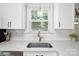 Close-up of the sink, showcasing stylish fixtures and a clean countertop space at 11359 Deer Ridge Ln, Charlotte, NC 28277