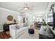 Bright living room connected to dining area with neutral tones, stylish furnishings and an open layout at 11359 Deer Ridge Ln, Charlotte, NC 28277