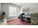 Comfortable home office with hardwood floors, fresh paint, and large bright window at 11359 Deer Ridge Ln, Charlotte, NC 28277