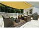 Inviting covered patio featuring cozy seating, stylish decor, and a charming outdoor ambiance at 11359 Deer Ridge Ln, Charlotte, NC 28277