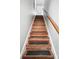 Staircase with secure steps, updated paint, and modern banister at 11359 Deer Ridge Ln, Charlotte, NC 28277
