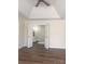 Bedroom with ensuite bathroom featuring stylish fixtures and double doors at 115 Morrocroft Ln, Mooresville, NC 28117