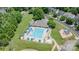 Aerial view of community pool, playground, and clubhouse amenities at 115 Morrocroft Ln, Mooresville, NC 28117