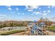 A vibrant playground next to the pool area ensures fun for all ages, offering a dynamic community space at 115 Morrocroft Ln, Mooresville, NC 28117