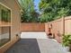 Cozy backyard patio with stained wood fence, perfect for outdoor entertaining at 1169 Stuarts Landing Dr, Cramerton, NC 28032
