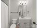 Bathroom featuring a toilet, sink with a white vanity, and a shower with a curtain at 1169 Stuarts Landing Dr, Cramerton, NC 28032