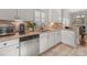 A kitchen area featuring granite countertops, stainless appliances, and white cabinets at 1169 Stuarts Landing Dr, Cramerton, NC 28032