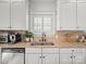 Kitchen with granite countertops, stainless steel appliances, and white cabinets at 1169 Stuarts Landing Dr, Cramerton, NC 28032