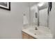 Cozy half-bathroom with vanity and mirror at 12004 Woodholm Ct, Tega Cay, SC 29708
