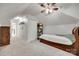Cozy bedroom with sloped ceilings, a closet, and carpeted flooring, offering a comfortable and private space at 12004 Woodholm Ct, Tega Cay, SC 29708