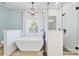 Modern bathroom featuring a standalone tub, a walk-in shower, and modern fixtures at 12434 Sylvan Oak Way, Charlotte, NC 28273