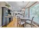 Charming dining area adjacent to the kitchen, with natural light and a view of the backyard at 12434 Sylvan Oak Way, Charlotte, NC 28273