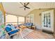 Relaxing screened-in porch with comfortable seating and access to the backyard at 12434 Sylvan Oak Way, Charlotte, NC 28273
