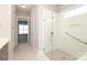 Bathroom featuring a spacious glass shower with bench and niche at 14019 Cameryn Elise Dr, Cornelius, NC 28031