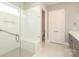 Bathroom featuring a spacious glass shower, and a double door linen closet at 14019 Cameryn Elise Dr, Cornelius, NC 28031