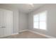 Cozy bedroom with carpet, a window, and neutral walls at 14019 Cameryn Elise Dr, Cornelius, NC 28031