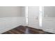 Foyer featuring decorative wall trim and wood flooring at 14019 Cameryn Elise Dr, Cornelius, NC 28031